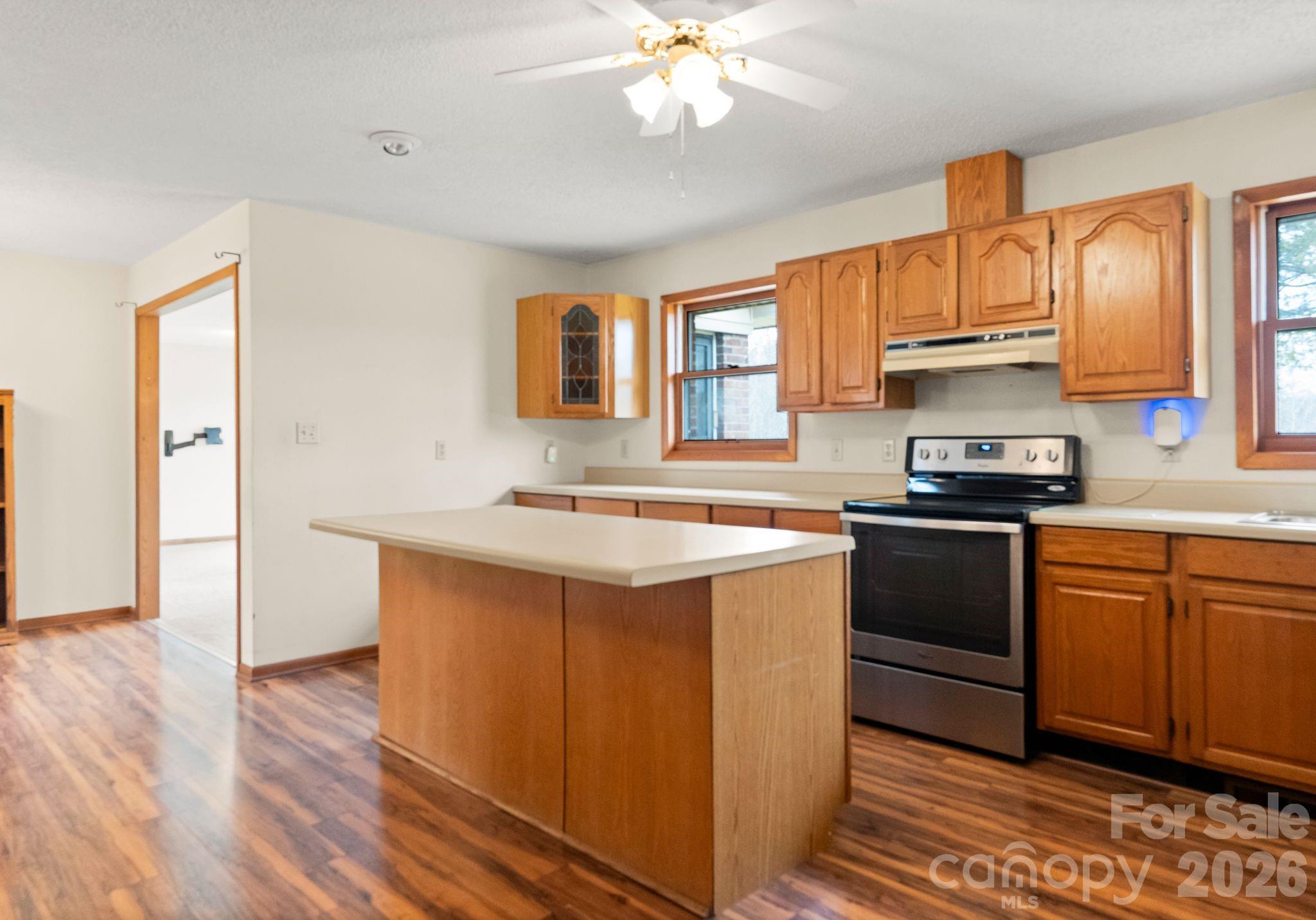 150 Barber Lyerly Road Salisbury, NC 28147 - Photo 10 of 43 a kitchen with a sink stove and cabinets
