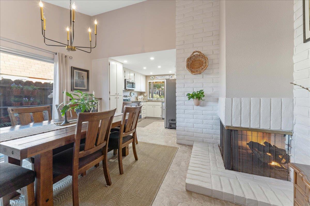 7770 Laurel Drive Gilroy, CA 95020 - Photo 14 of 35 a view of a dining room with furniture and wooden floor