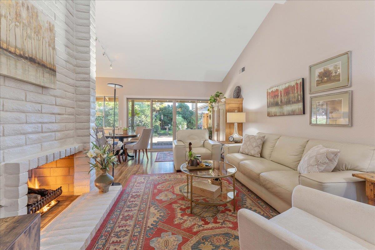 7770 Laurel Drive Gilroy, CA 95020 - Photo 7 of 35 a living room with furniture and a flat screen tv