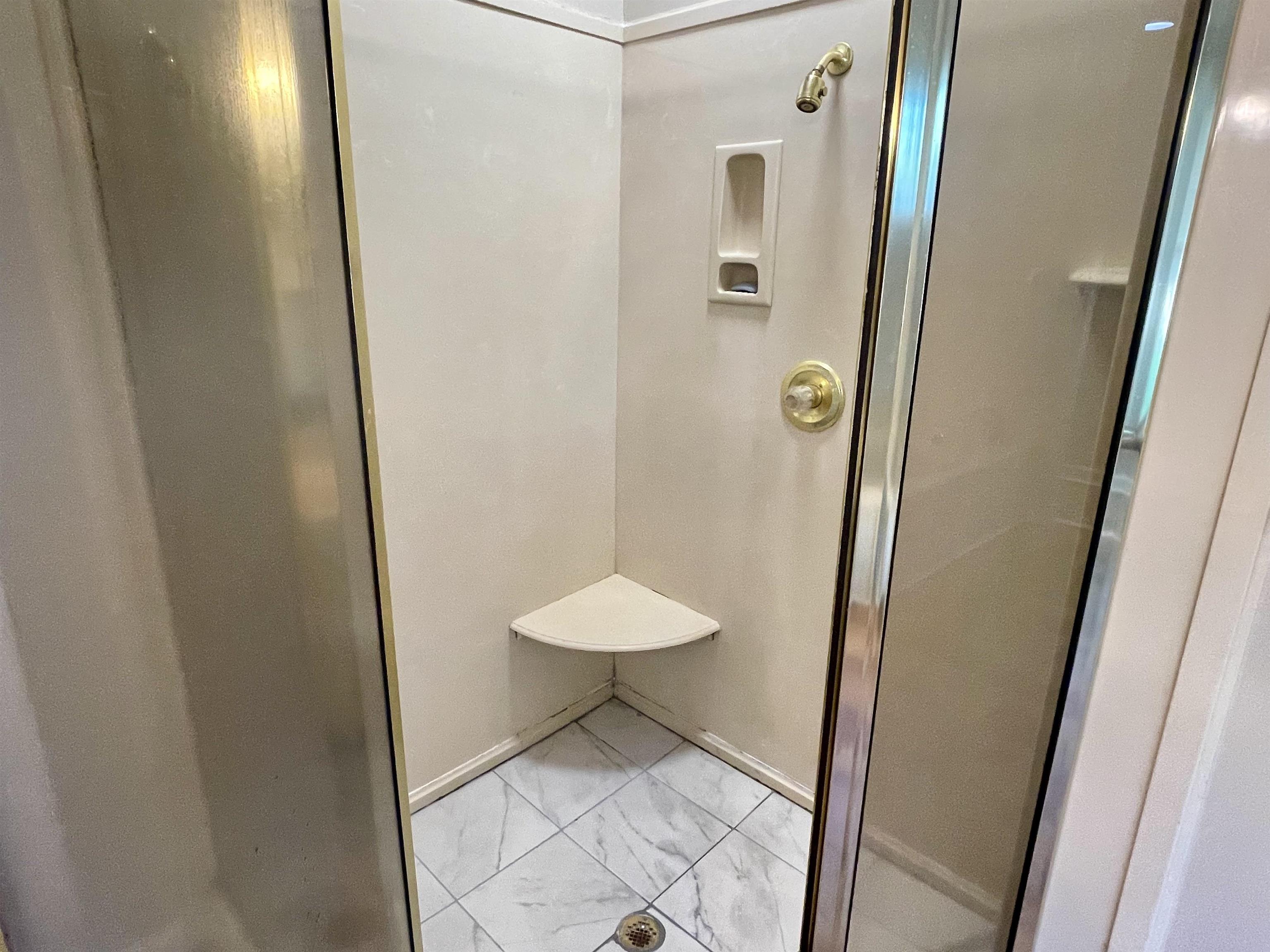 83 McCall Drive Collierville, TN 38017 - Photo 23 of 39 a bathroom with a shower and toilet