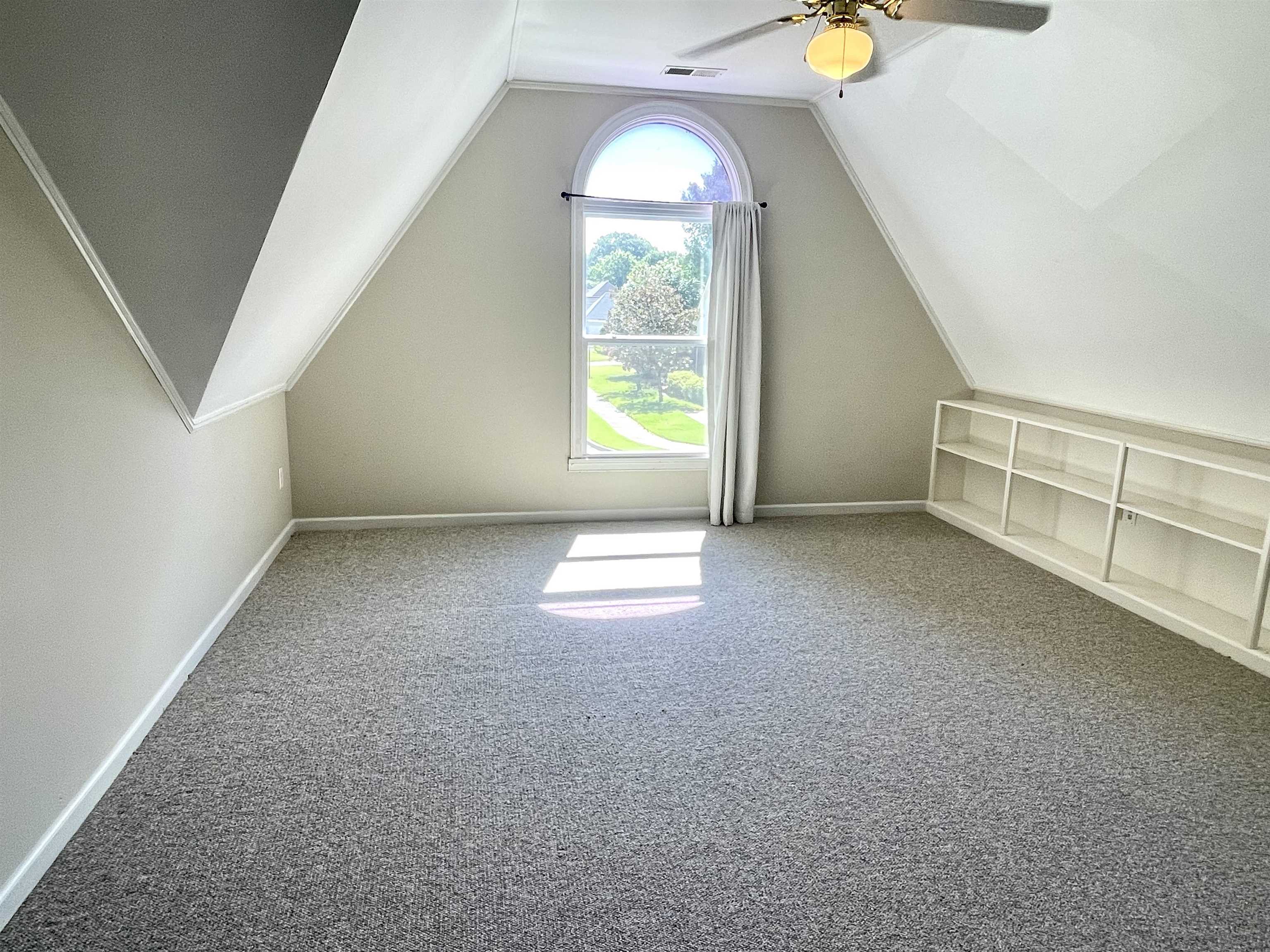 83 McCall Drive Collierville, TN 38017 - Photo 33 of 39 an empty room with windows and entrance