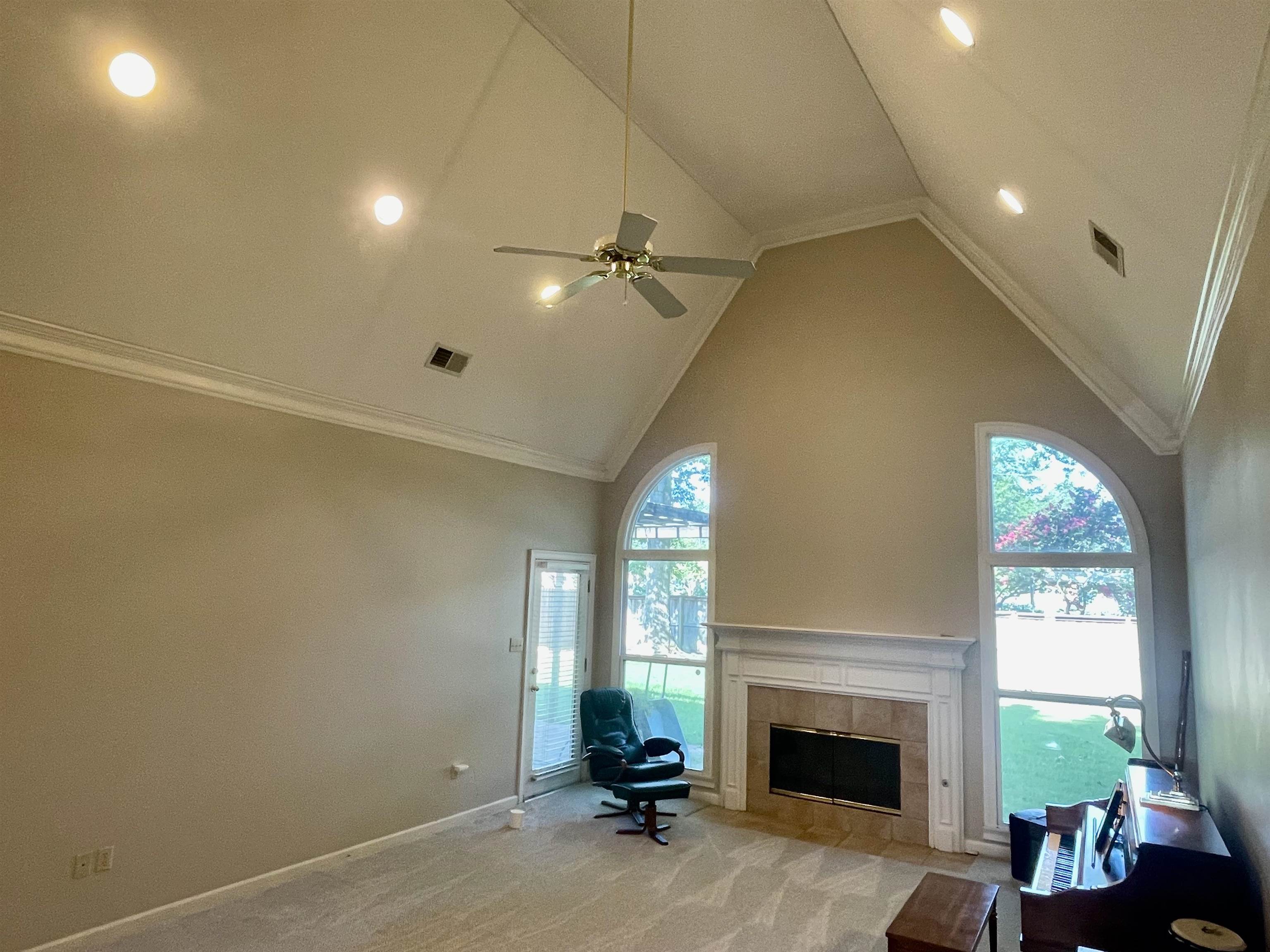 83 McCall Drive Collierville, TN 38017 - Photo 8 of 39 a living room with furniture and a fireplace