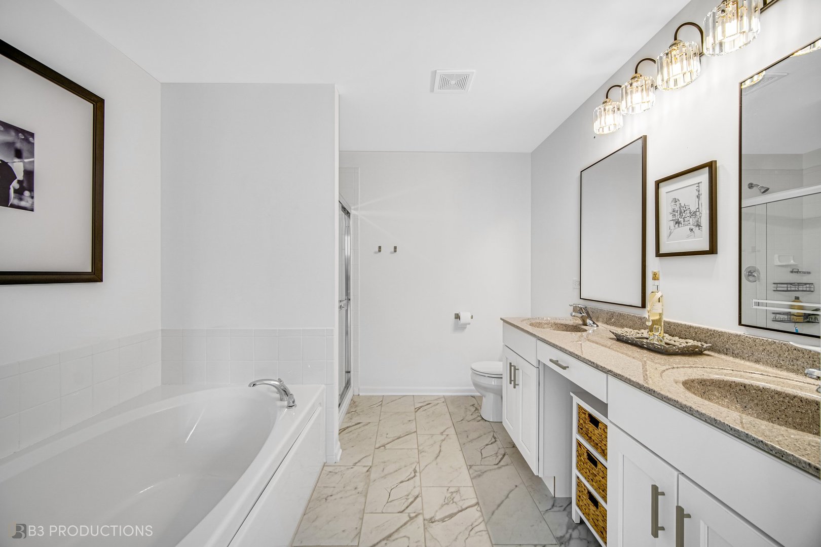 1684 Edentenny Road New Lenox, IL 60451 - Photo 13 of 22 a spacious bathroom with a granite countertop sink a mirror a bathtub and shower
