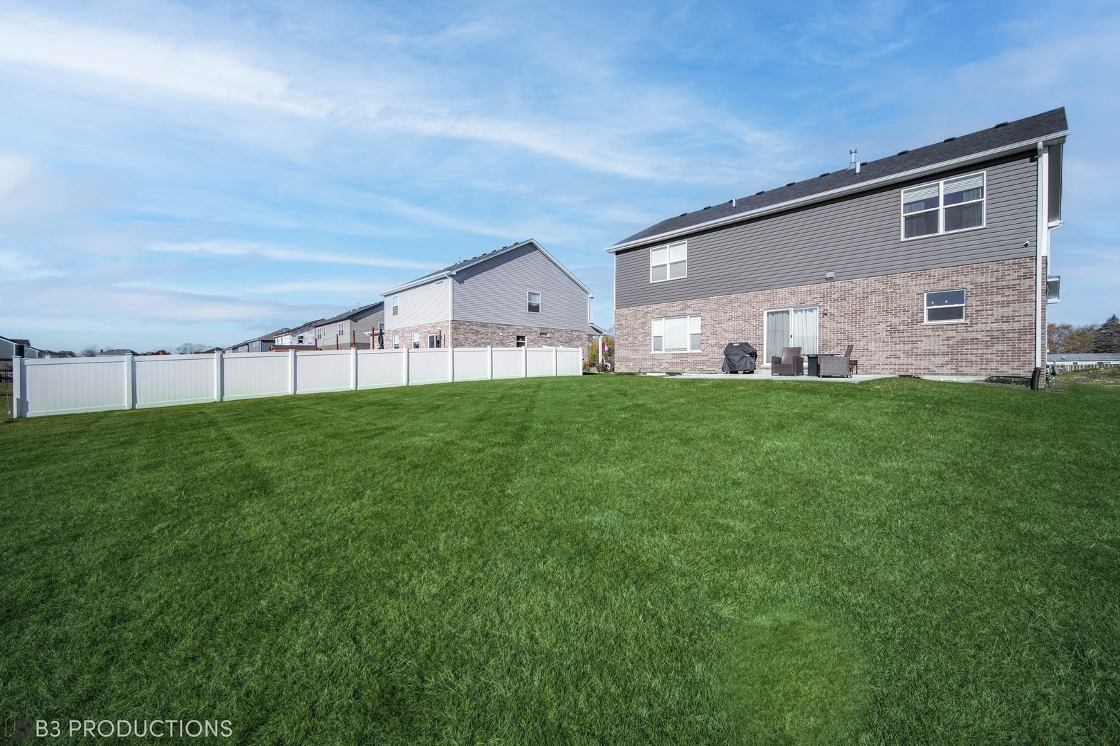 1684 Edentenny Road New Lenox, IL 60451 - Photo 20 of 22 a backyard of a house with lots of green space and garden