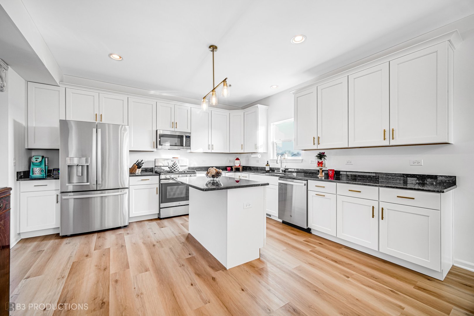 1684 Edentenny Road New Lenox, IL 60451 - Photo 6 of 22 a kitchen with white cabinets stainless steel appliances and wooden floor