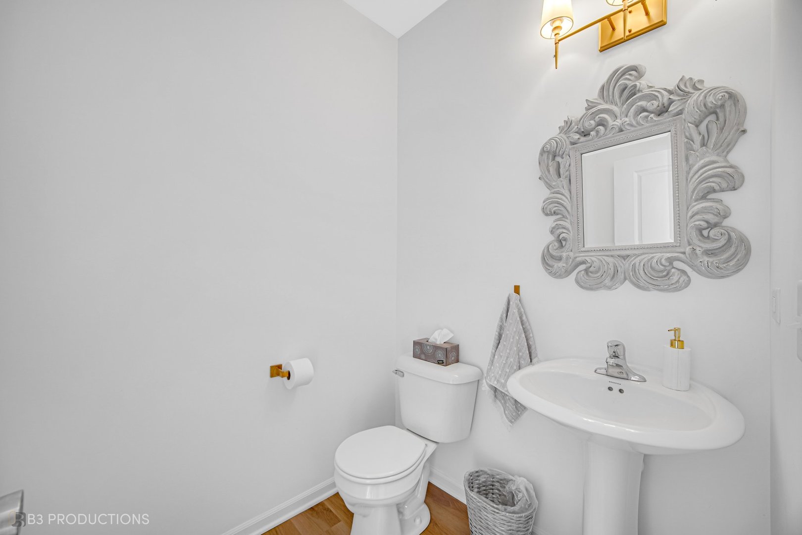 1684 Edentenny Road New Lenox, IL 60451 - Photo 9 of 22 a bathroom with a sink mirror vanity and toilet