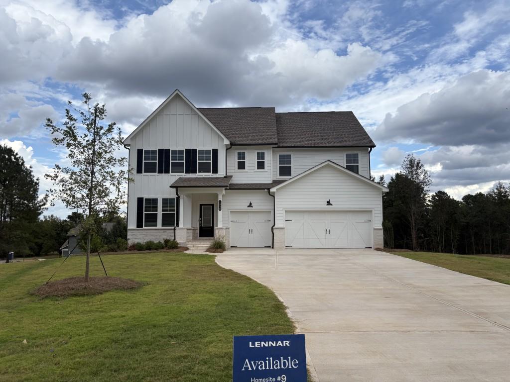 front view of a house with a yard