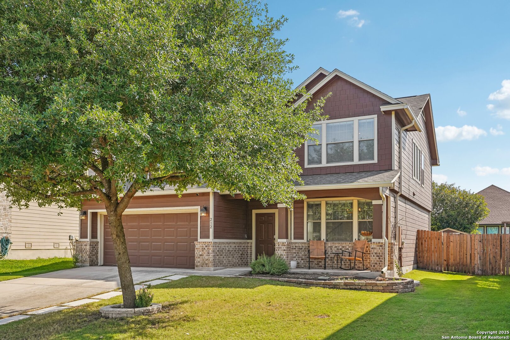 a front view of house with yard