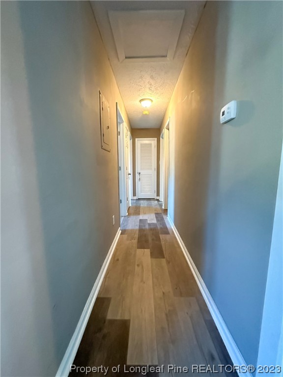 1645 Flintshire Road Fayetteville, NC 28304 - Photo 12 of 22 a view of a hallway with wooden floor