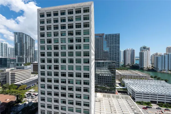 a view of a city with tall buildings