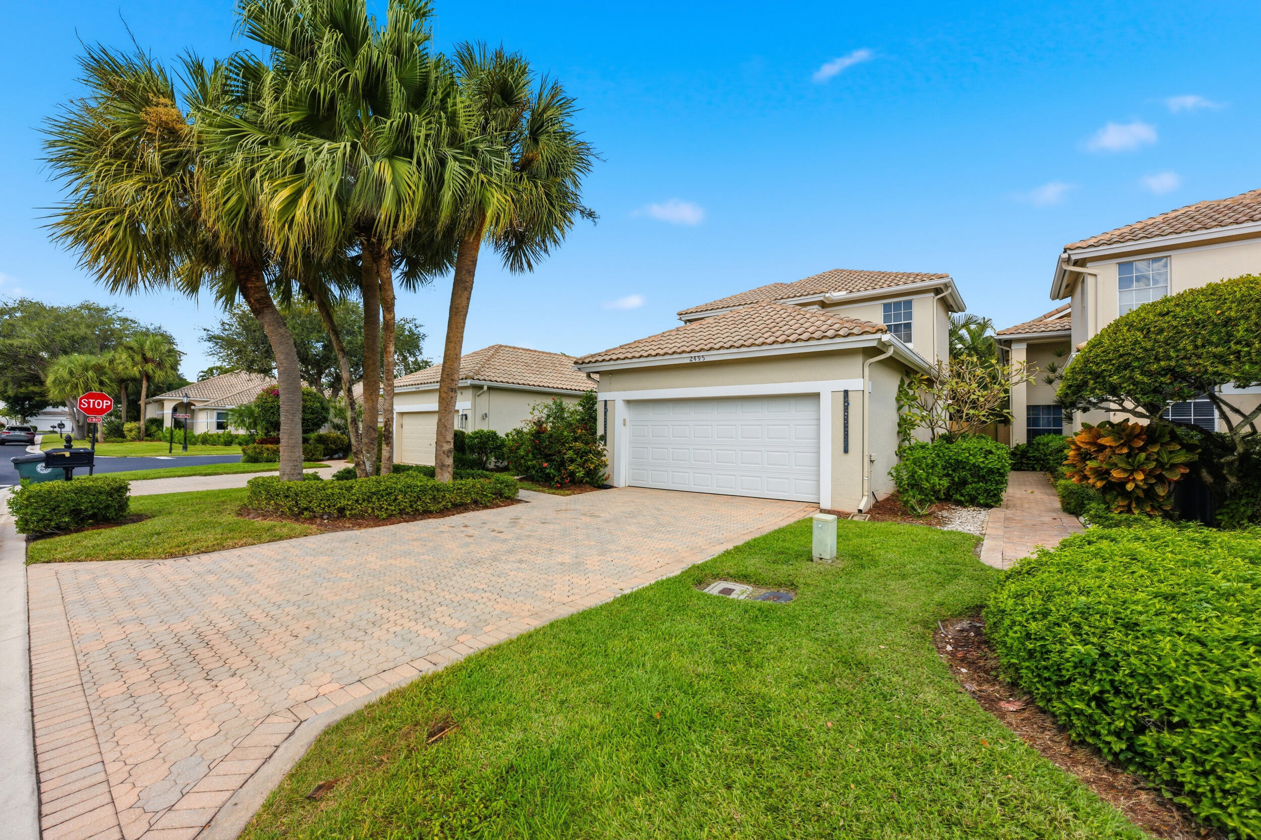 2495 Northwest 66th Drive Boca Raton, FL 33496 - Photo 5 of 74 a front view of house with yard and green space