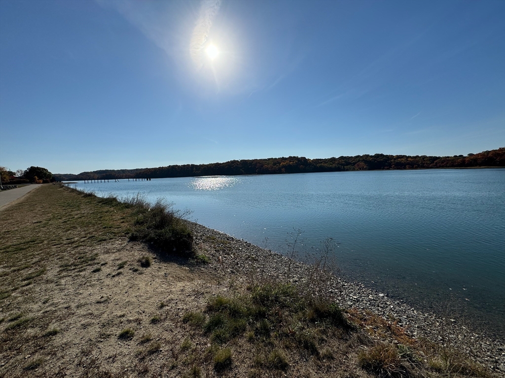 3 Beal's Cove Road, Unit H Hingham, MA 02043 - Photo 13 of 13 a view of a lake from a yard