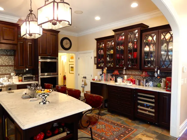 a living room with furniture fireplace and flat screen tv