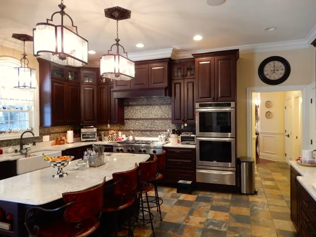 a living room with furniture fireplace and flat screen tv