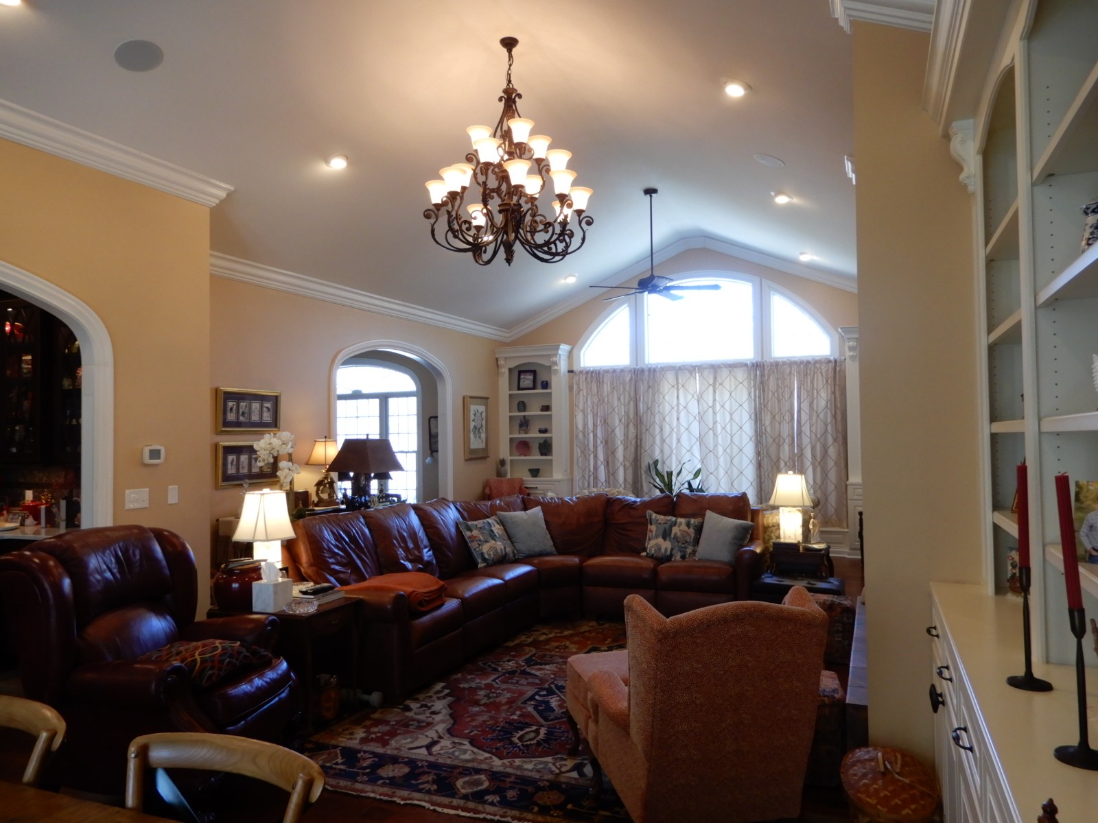 135 Allegheny Road Gilbertsville, KY 42044 - Photo 23 of 78 a living room with furniture a chandelier and a flat screen tv