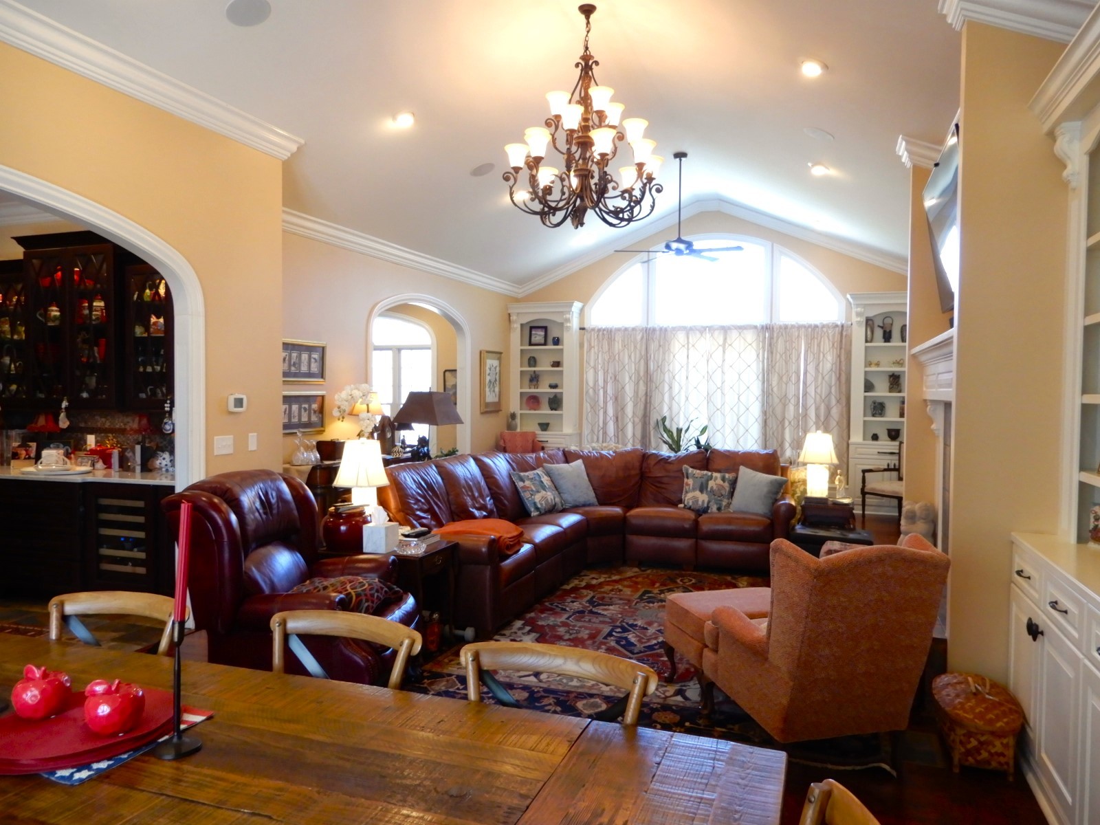 135 Allegheny Road Gilbertsville, KY 42044 - Photo 25 of 78 a living room with furniture a chandelier and a fireplace
