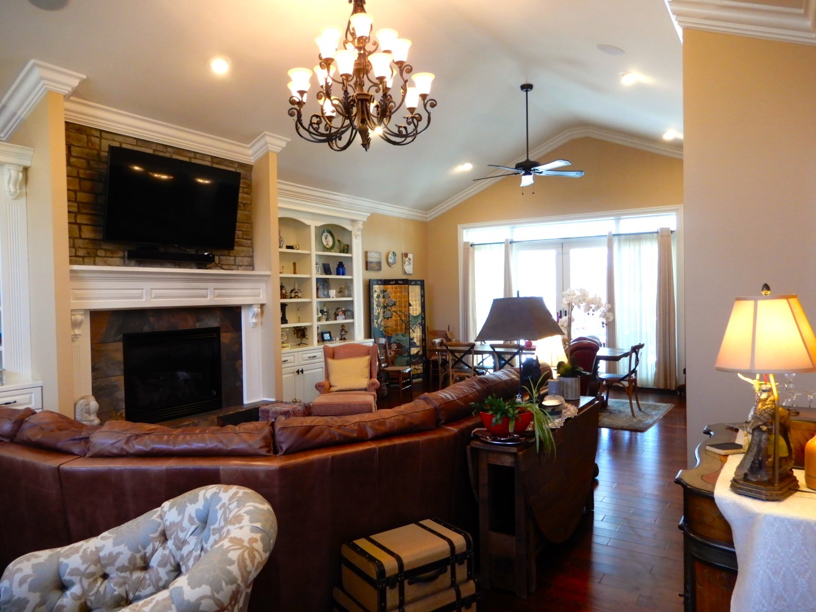 135 Allegheny Road Gilbertsville, KY 42044 - Photo 28 of 78 a living room with furniture fireplace and flat screen tv