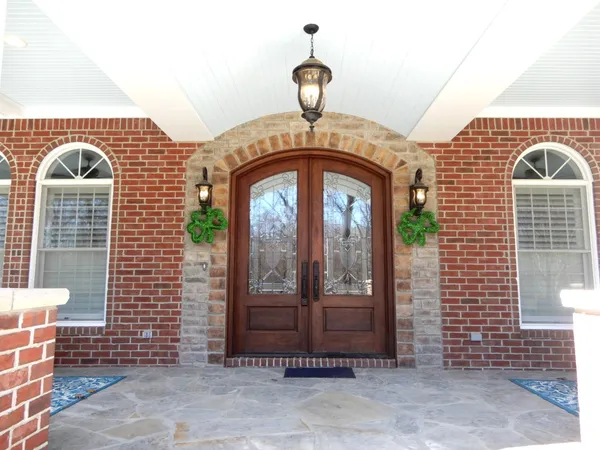 a view of swimming pool from a balcony