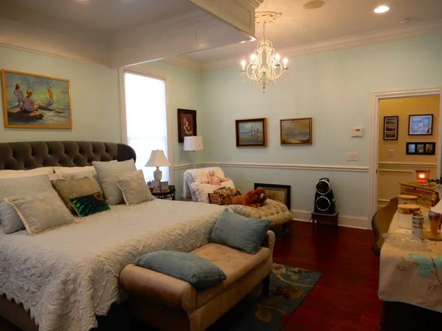 a bedroom with a bed and closet