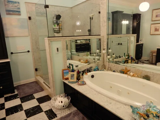 a kitchen with a sink a stove and cabinets