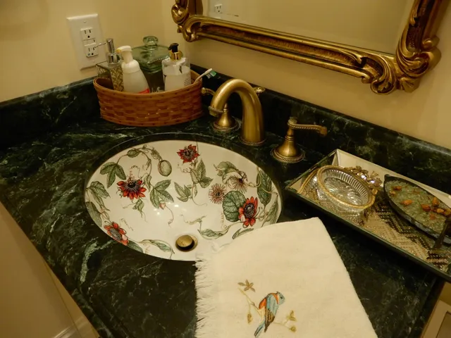 an aerial view of a house with a yard and trees