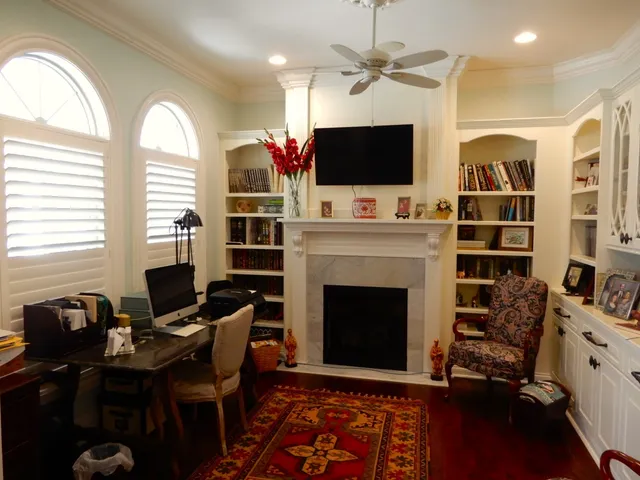 a kitchen with granite countertop a refrigerator stove and sink