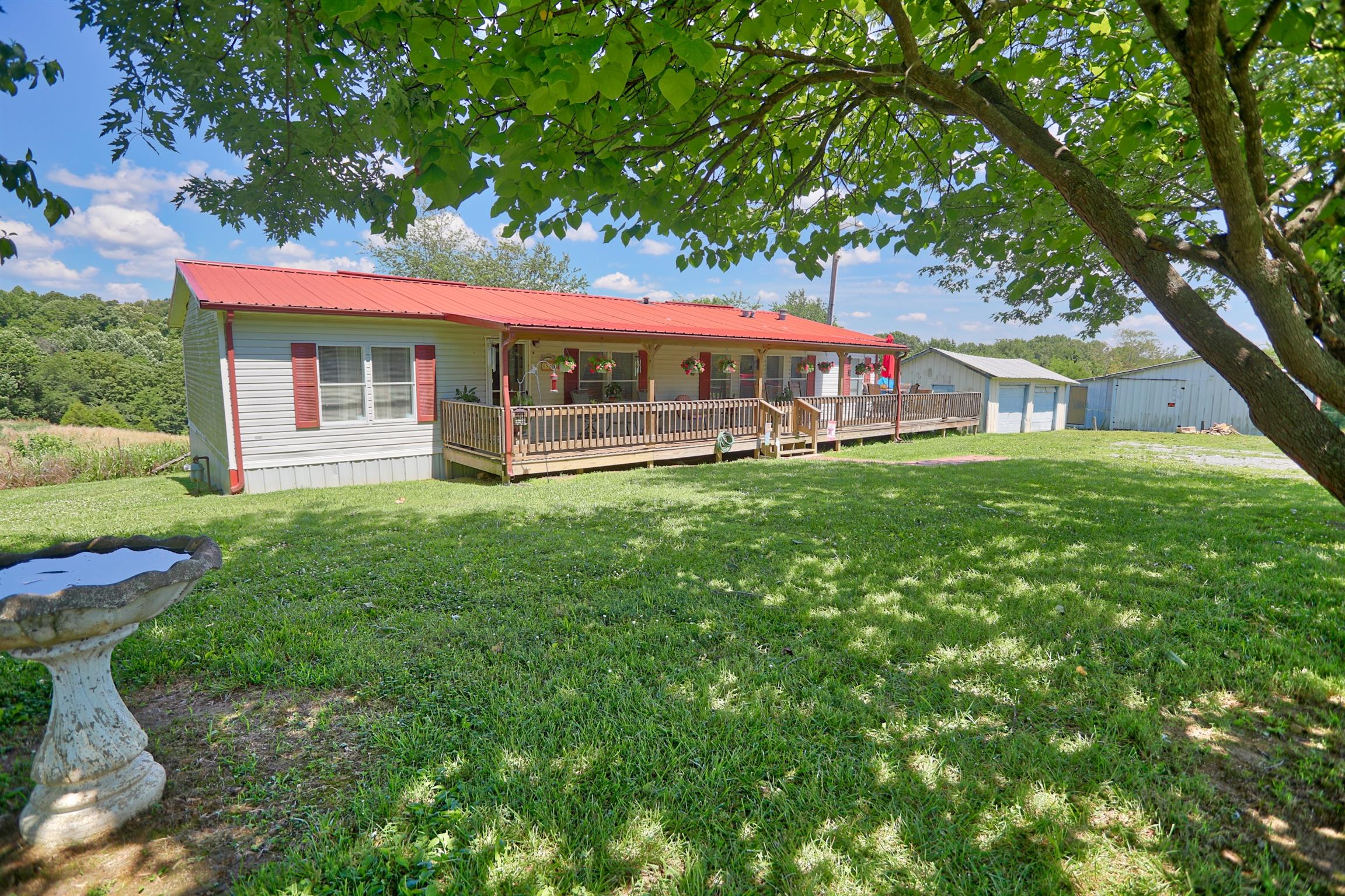 952 North Corinth Road Portland, TN 37148 - Photo 1 of 25 front view of a house with a yard