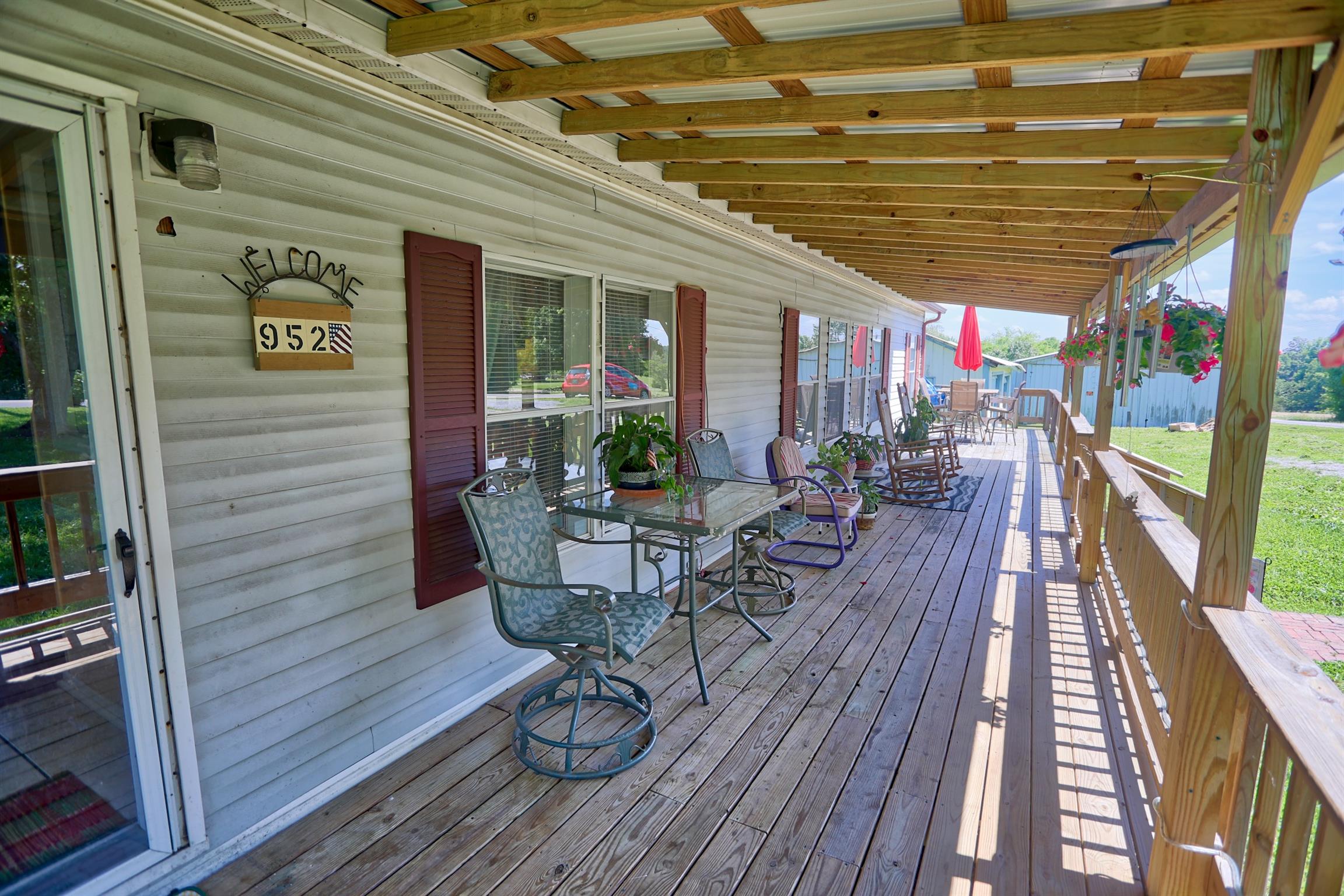 952 North Corinth Road Portland, TN 37148 - Photo 2 of 25 a view of a porch with furniture