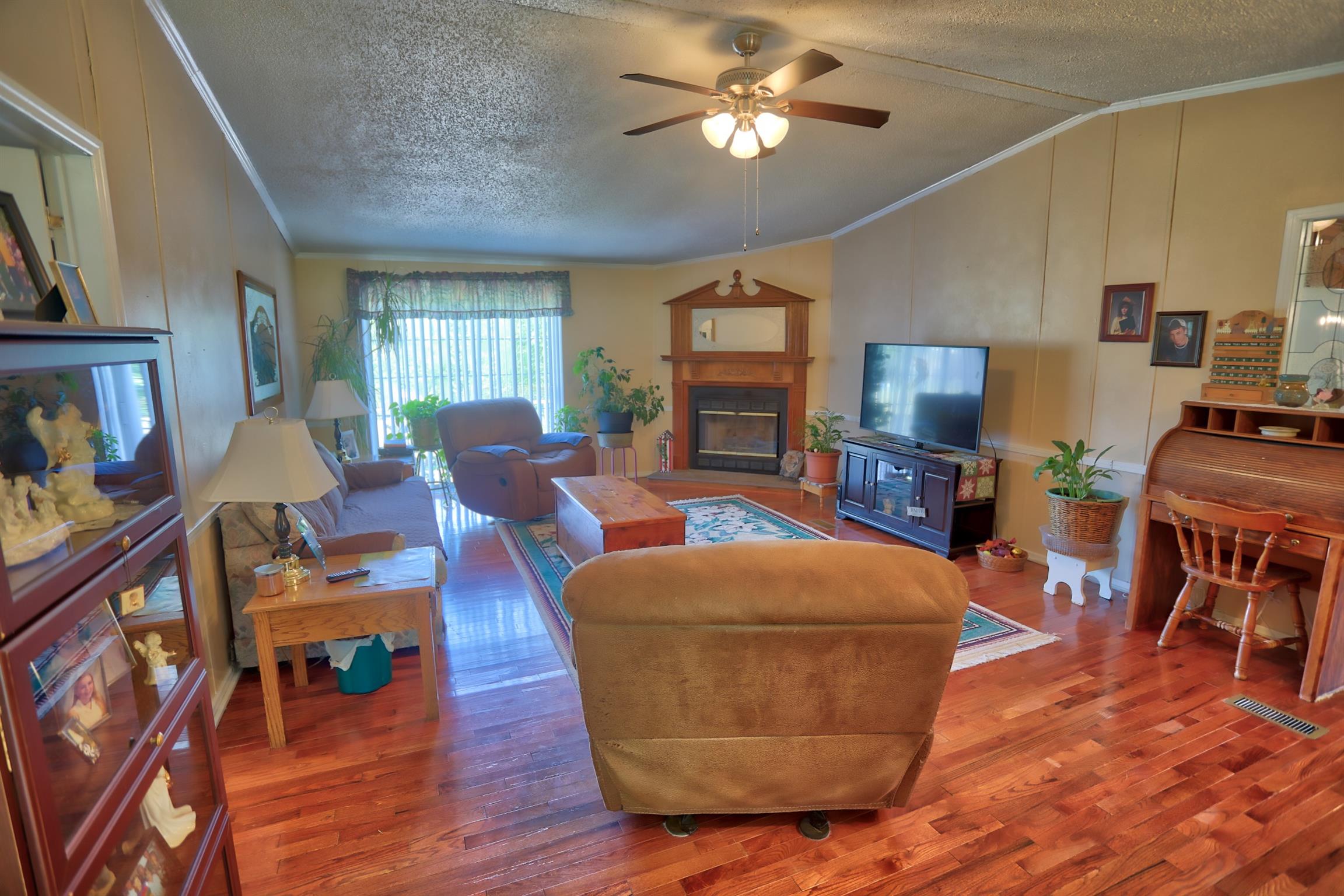 952 North Corinth Road Portland, TN 37148 - Photo 3 of 25 a living room with furniture and a wooden floor