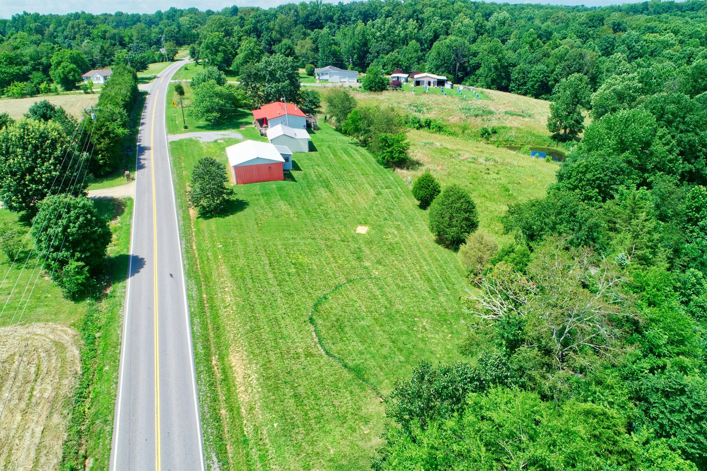 952 North Corinth Road Portland, TN 37148 - Photo 23 of 25 a green field with lots of trees