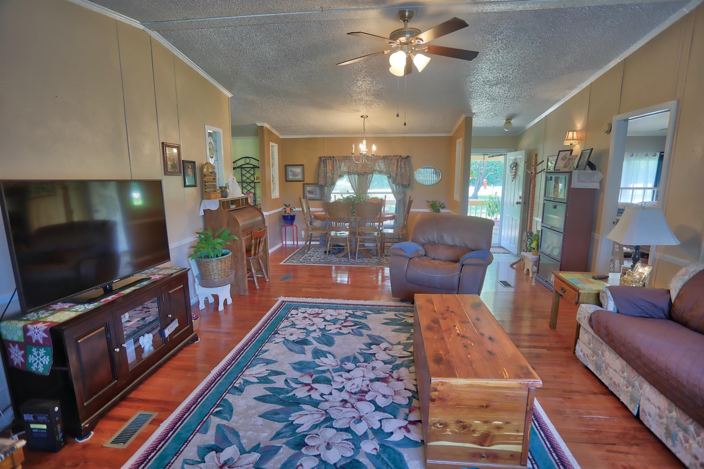 952 North Corinth Road Portland, TN 37148 - Photo 5 of 25 a living room with furniture and a flat screen tv
