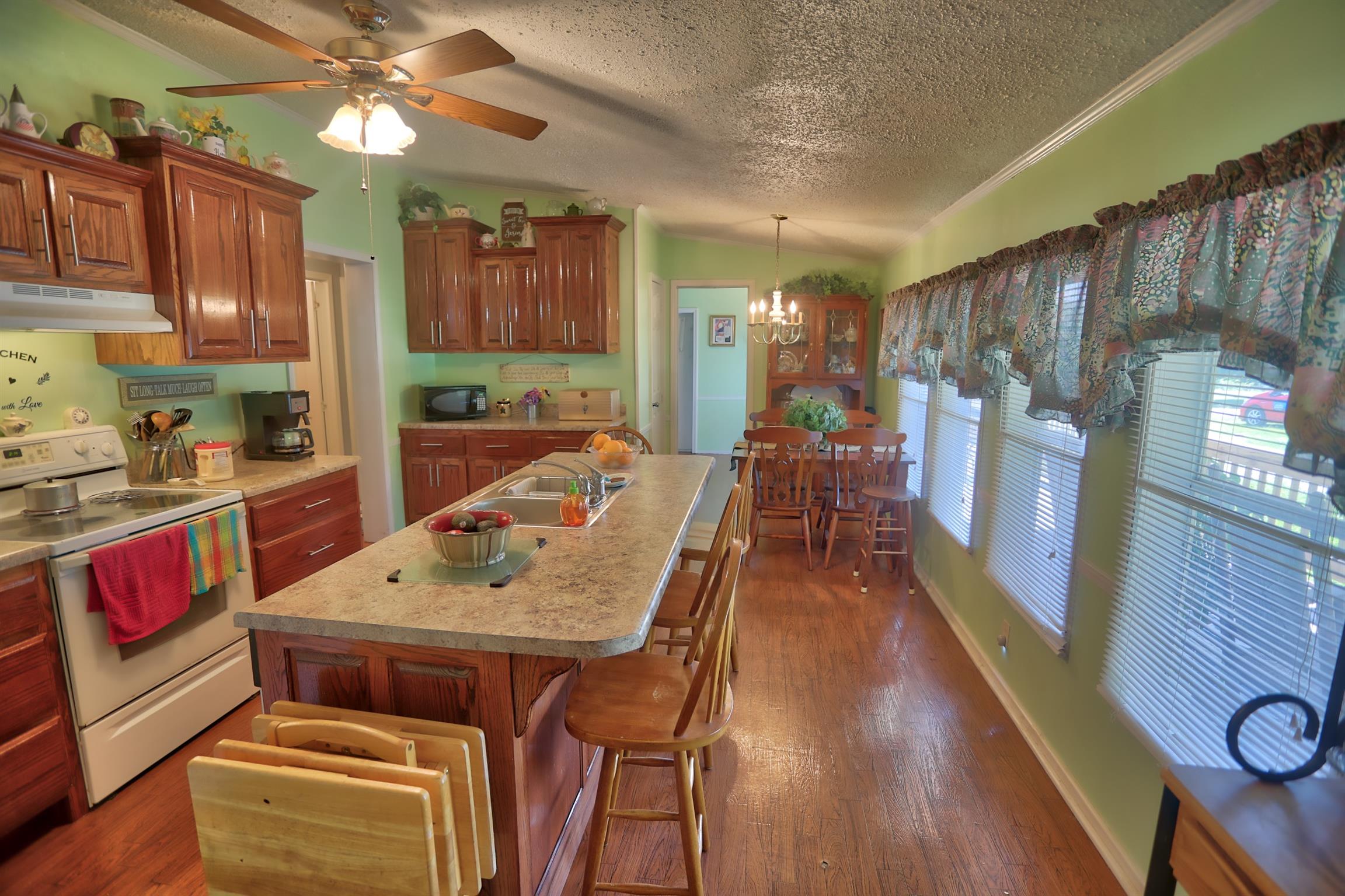 952 North Corinth Road Portland, TN 37148 - Photo 7 of 25 a view of a dining room with furniture window and wooden floor