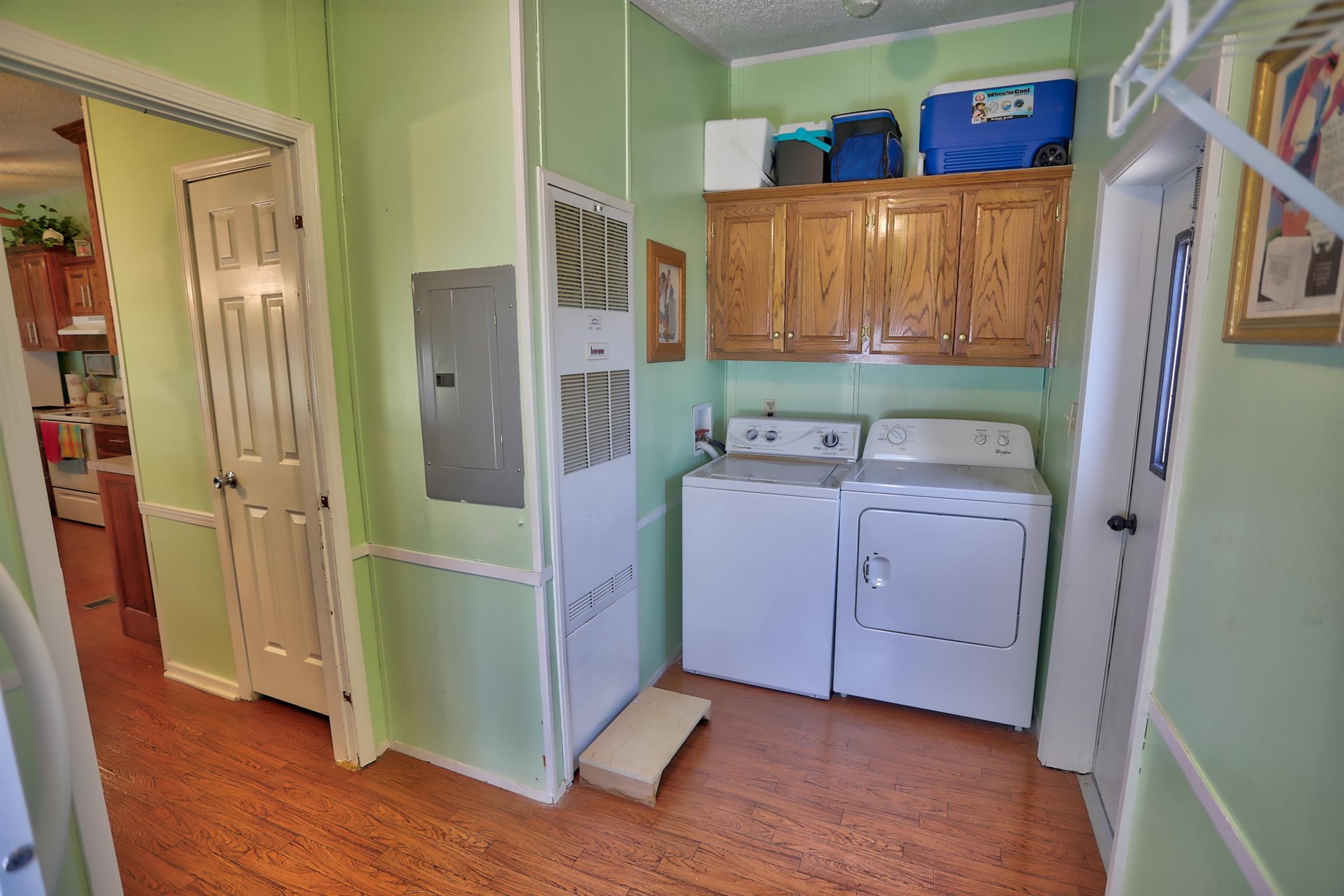 952 North Corinth Road Portland, TN 37148 - Photo 9 of 25 a room with cabinets and wooden floor