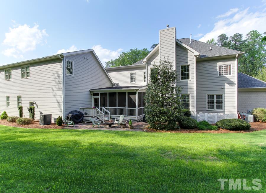 936 Oak Creek Road Raleigh, NC 27615 - Photo 25 of 25 a front view of house with yard and green space