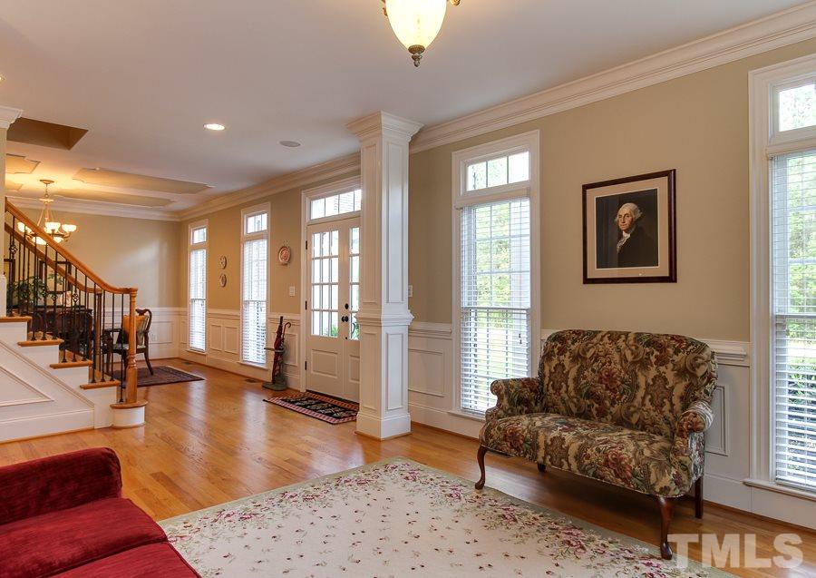 936 Oak Creek Road Raleigh, NC 27615 - Photo 4 of 25 a living room with furniture and a large window