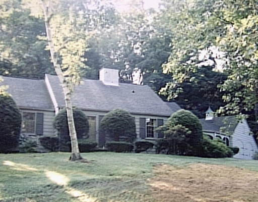 11 Colonial Road Wilbraham, MA 01095 - Photo 1 of 1 a house that has a tree in front of it