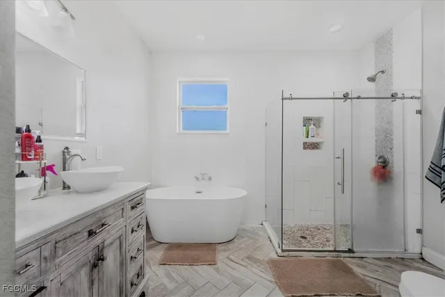 a bathroom with a sink and a bathtub