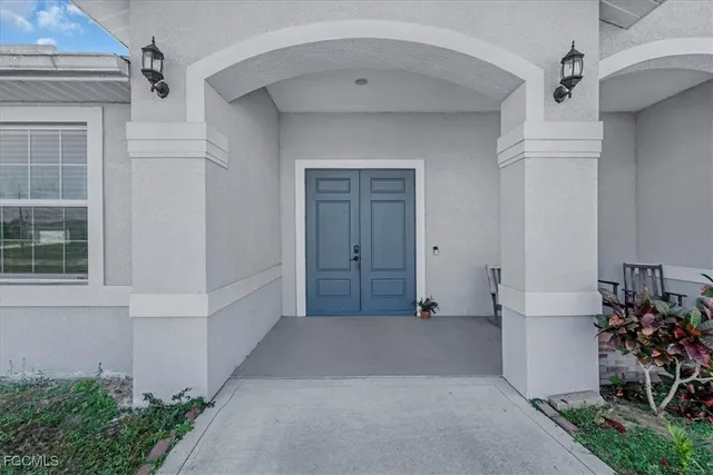 a livingroom with furniture and a window