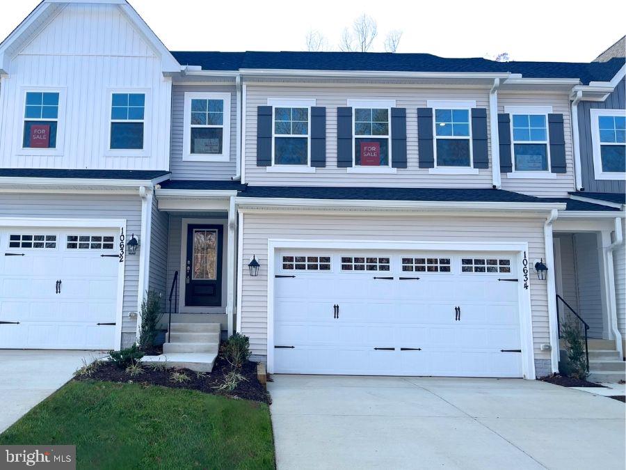 10634 Afton Grove Court Fredericksburg, VA 22408 - Photo 1 of 25 a front view of building with yard