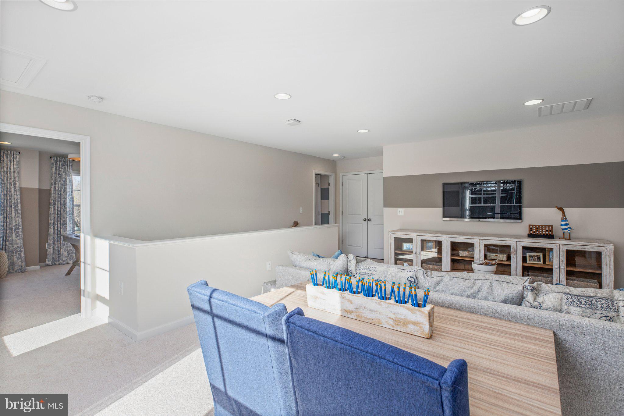 10634 Afton Grove Court Fredericksburg, VA 22408 - Photo 16 of 25 a living room with furniture and kitchen view