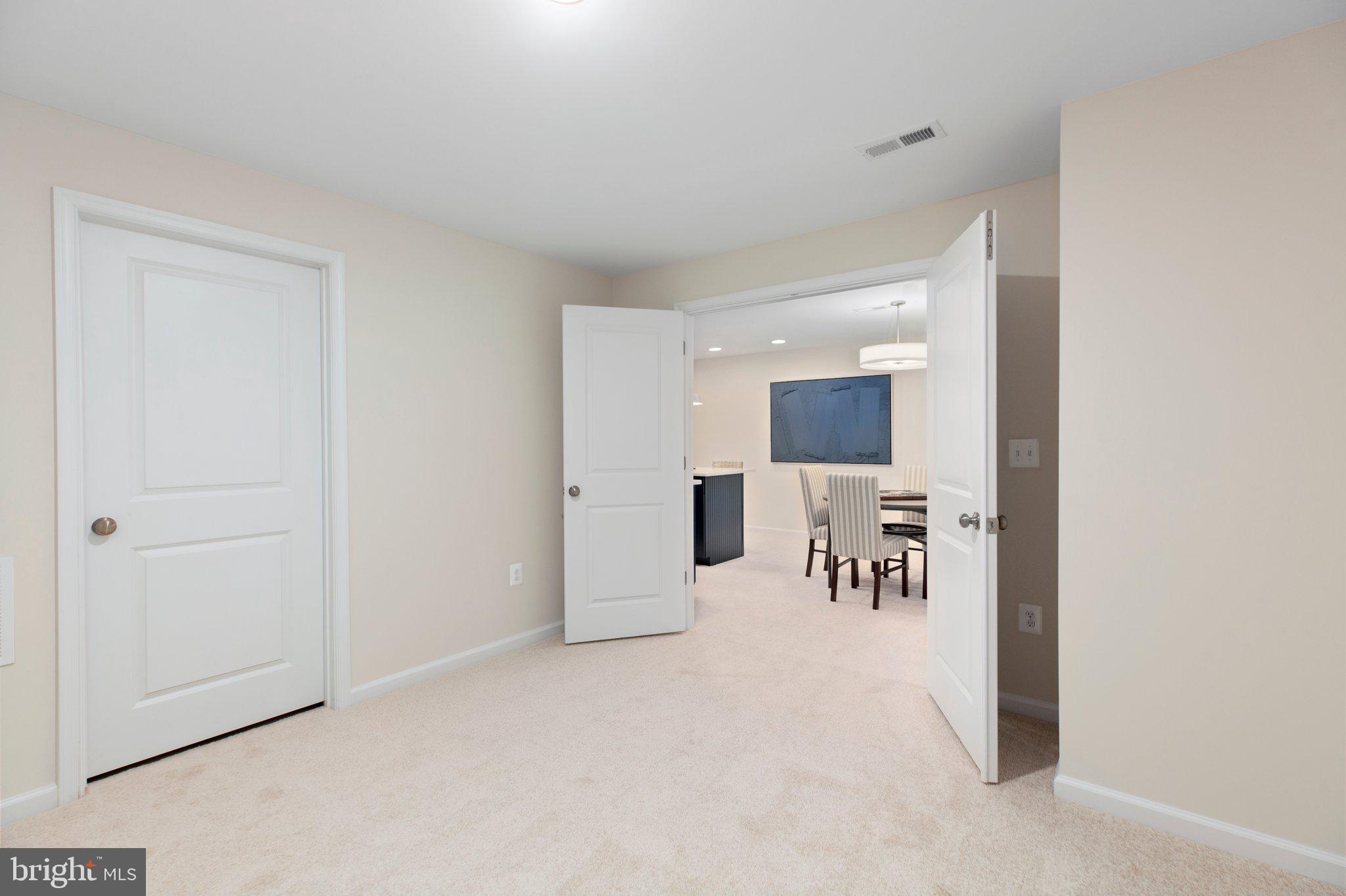 10634 Afton Grove Court Fredericksburg, VA 22408 - Photo 22 of 25 a view of a livingroom with a furniture and chandelier fan