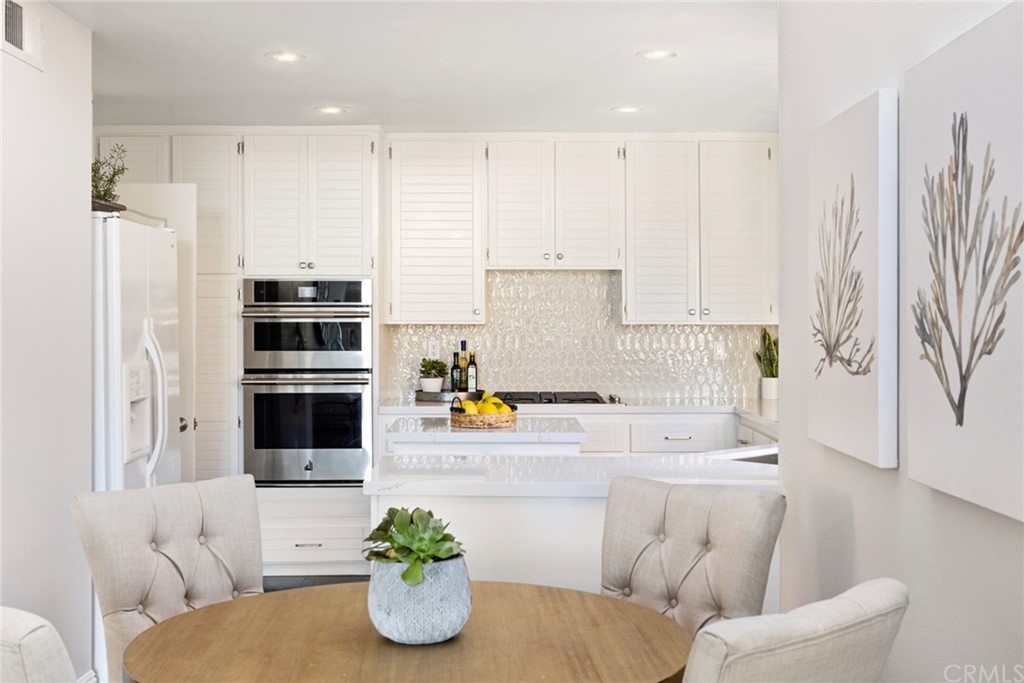 24955 Seagate Drive Dana Point, CA 92629 - Photo 12 of 39 a living room with furniture and a potted plant
