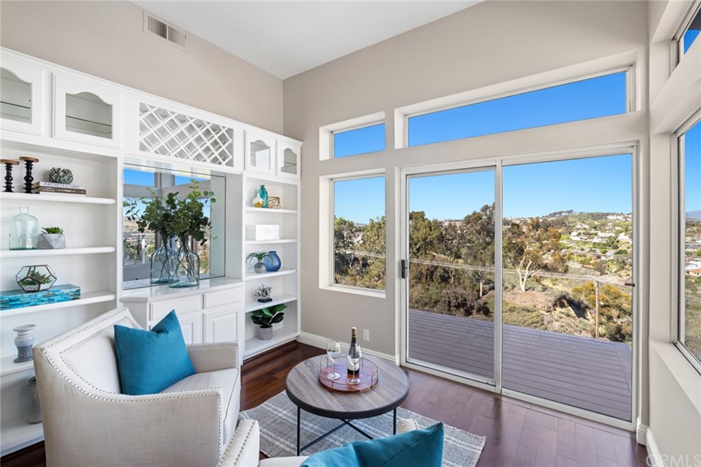 24955 Seagate Drive Dana Point, CA 92629 - Photo 13 of 39 a living room with furniture and a potted plant