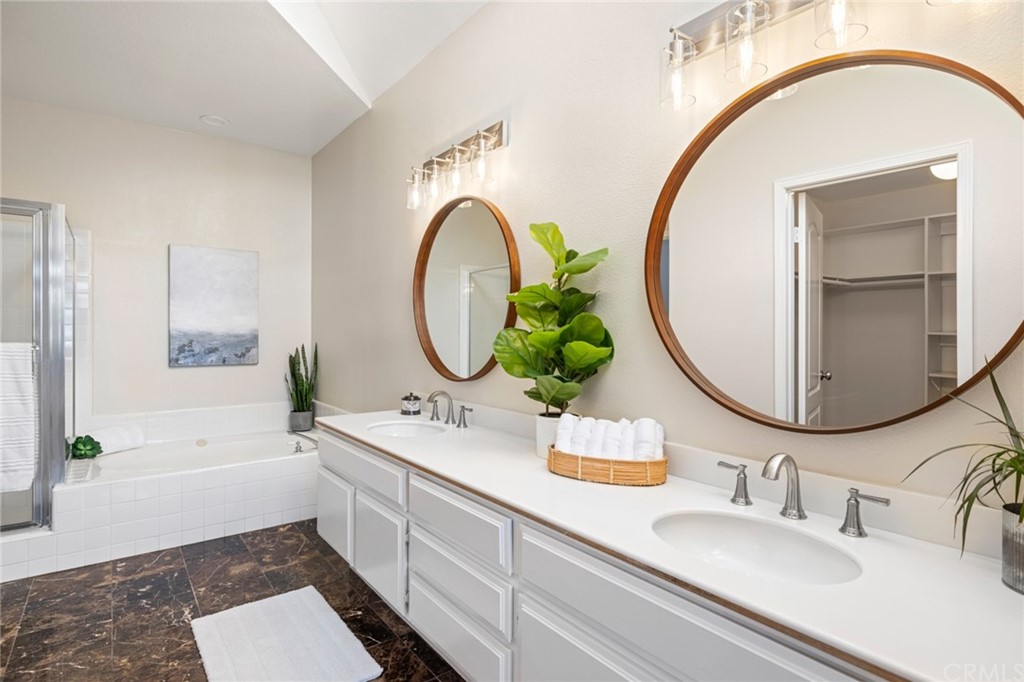 24955 Seagate Drive Dana Point, CA 92629 - Photo 17 of 39 a bathroom with a sink and a mirror