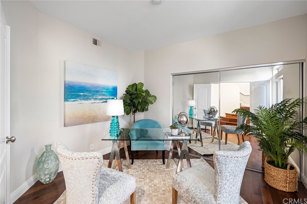 24955 Seagate Drive Dana Point, CA 92629 - Photo 20 of 39 a living room with furniture and a potted plant