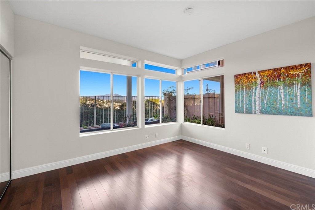24955 Seagate Drive Dana Point, CA 92629 - Photo 21 of 39 a view of livingroom with furniture and floor to ceiling window