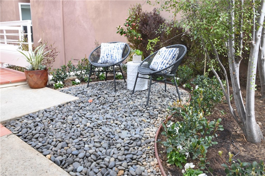 24955 Seagate Drive Dana Point, CA 92629 - Photo 27 of 39 a view of a chairs and table in a patio