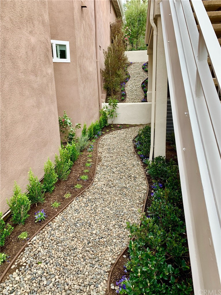 24955 Seagate Drive Dana Point, CA 92629 - Photo 30 of 39 a view of a backyard with pathway
