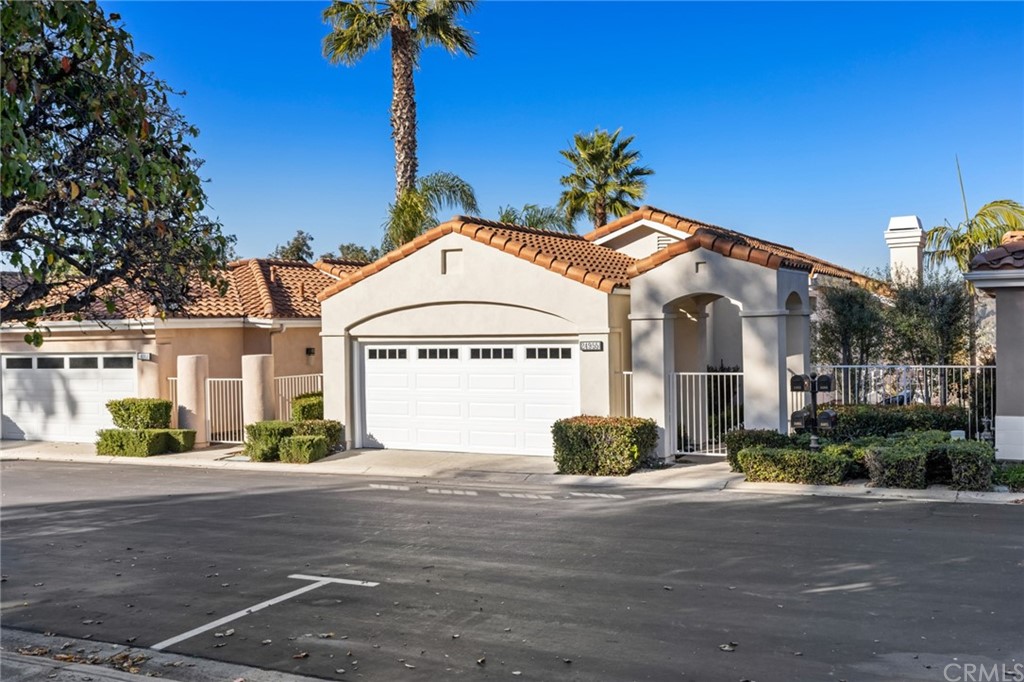 24955 Seagate Drive Dana Point, CA 92629 - Photo 38 of 39 a front view of a house with a yard