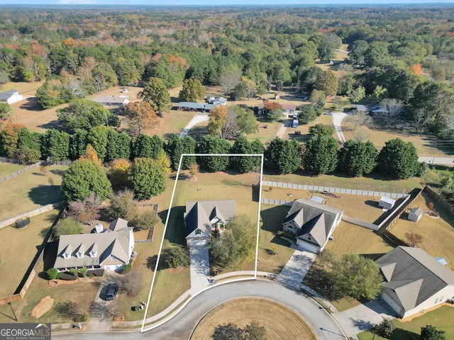 an aerial view of a livingroom with furniture